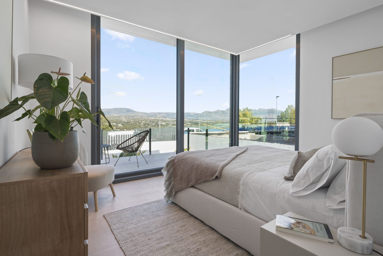 A bright bedroom with stunning sea and city views in a 4-bedroom villa in Benidorm - The Estates