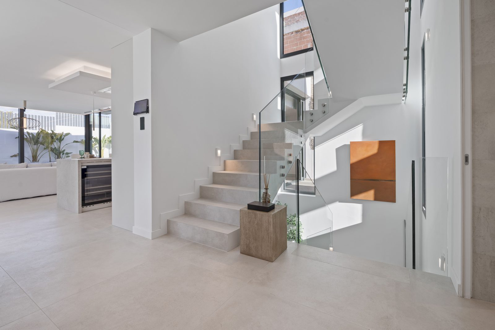 Modern staircase design inside a 4-bedroom villa in Benidorm with sea and city views - The Estates