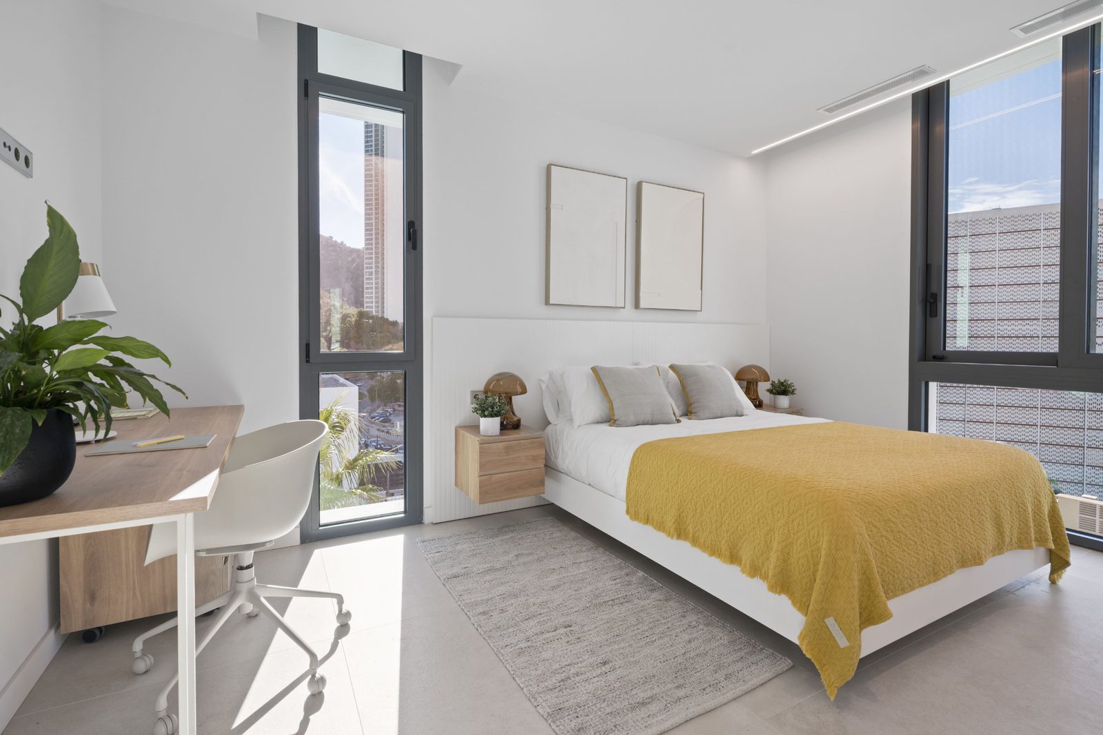 A bright bedroom with city and sea views in a 4-bedroom villa in Benidorm - The Estates
