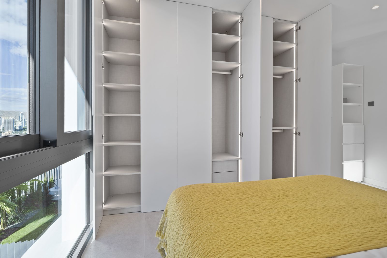 Stylish built-in wardrobes in a bedroom of a 4-bedroom villa in Benidorm - The Estates