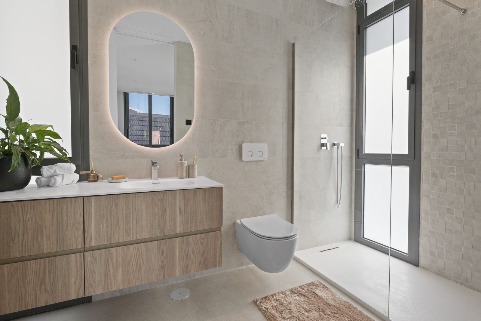 A modern bathroom with stylish fixtures in a 4-bedroom villa in Benidorm - The Estates
