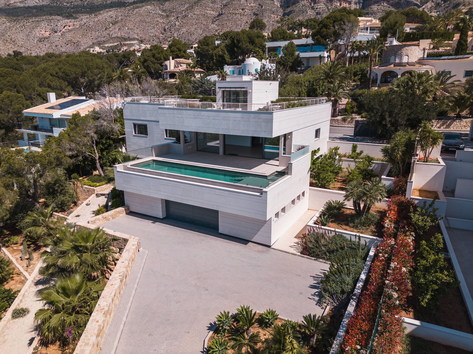 A modern villa with a pool and stunning views of Altea - The Estates