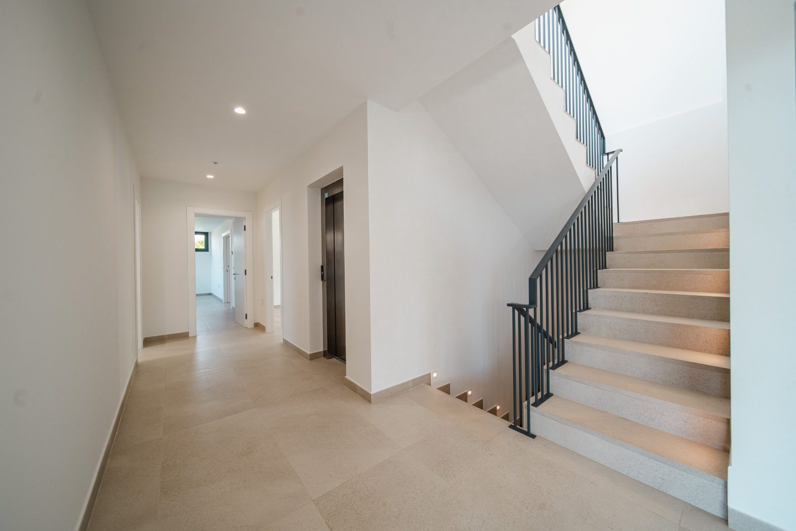Modern hallway and staircase inside a 5-bedroom villa in Altea - The Estates