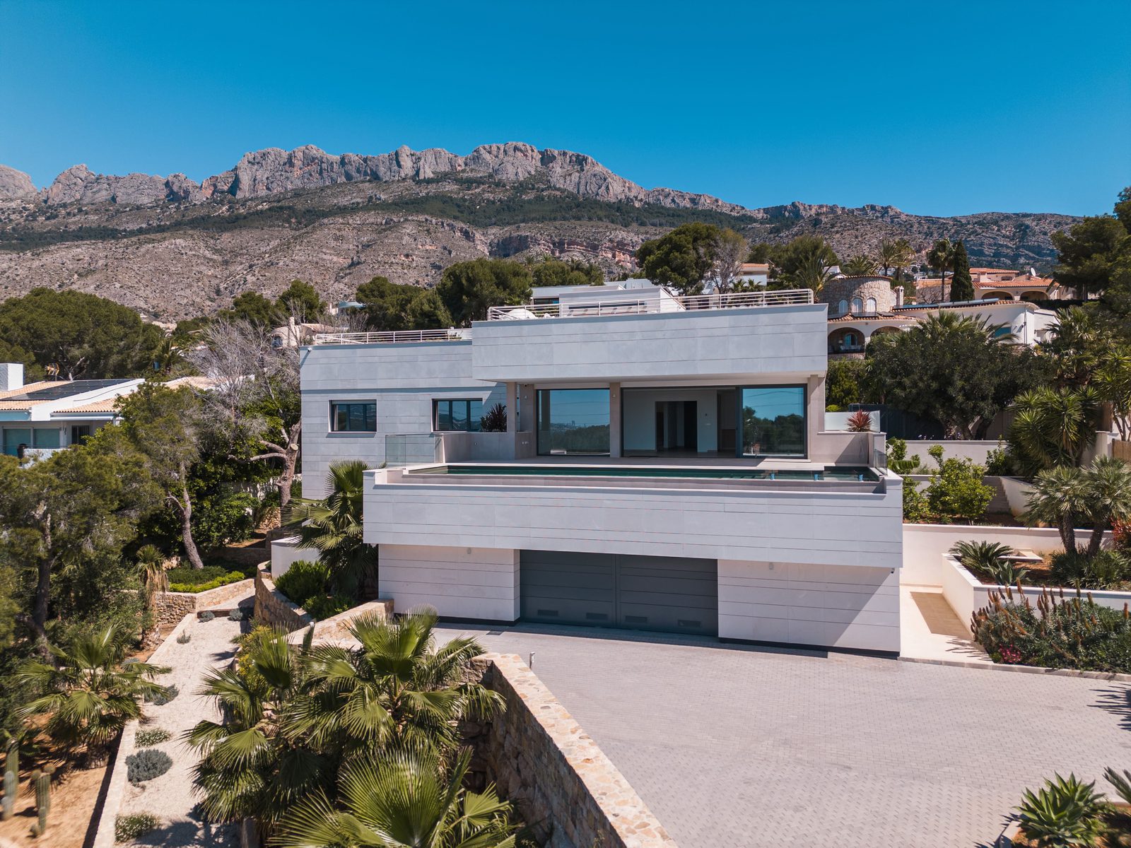 Modern villa with sea and golf views nestled in lush greenery in Altea - The Estates