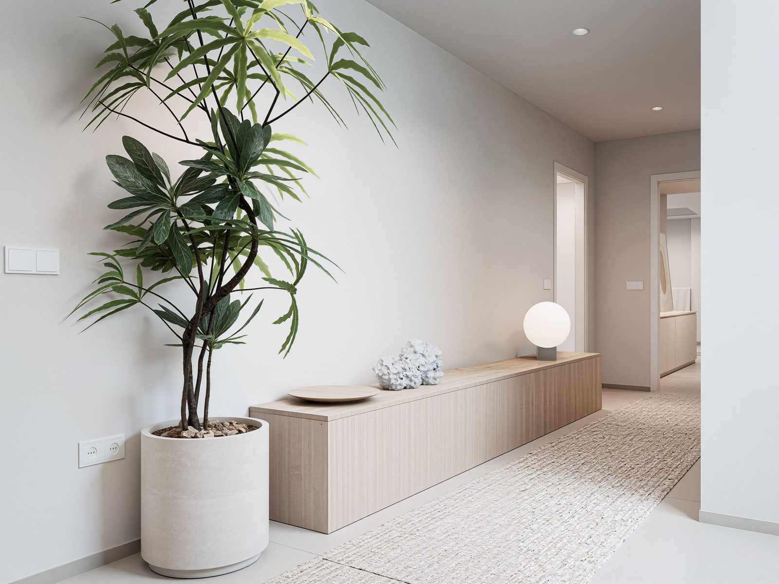 Stylish interior hallway with a large plant and modern decor in a 5-bedroom villa in Altea - The Estates