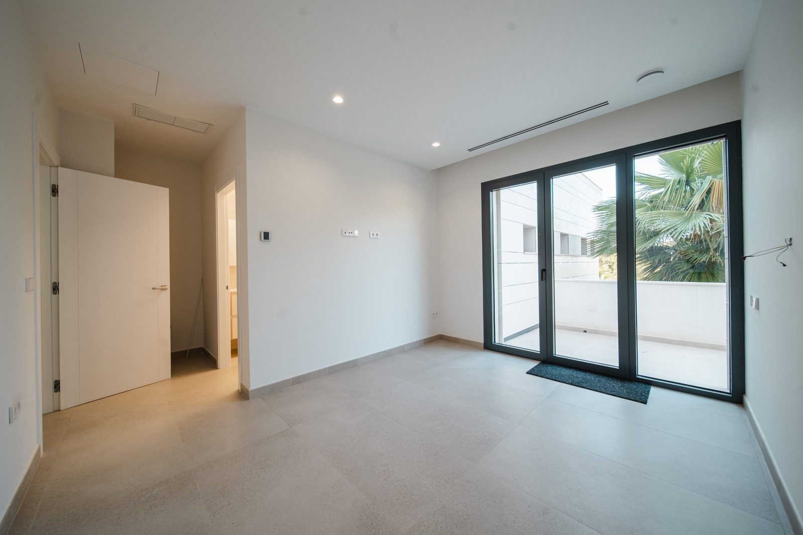 Bright interior with large windows and doors in a 5-bedroom villa in Altea - The Estates