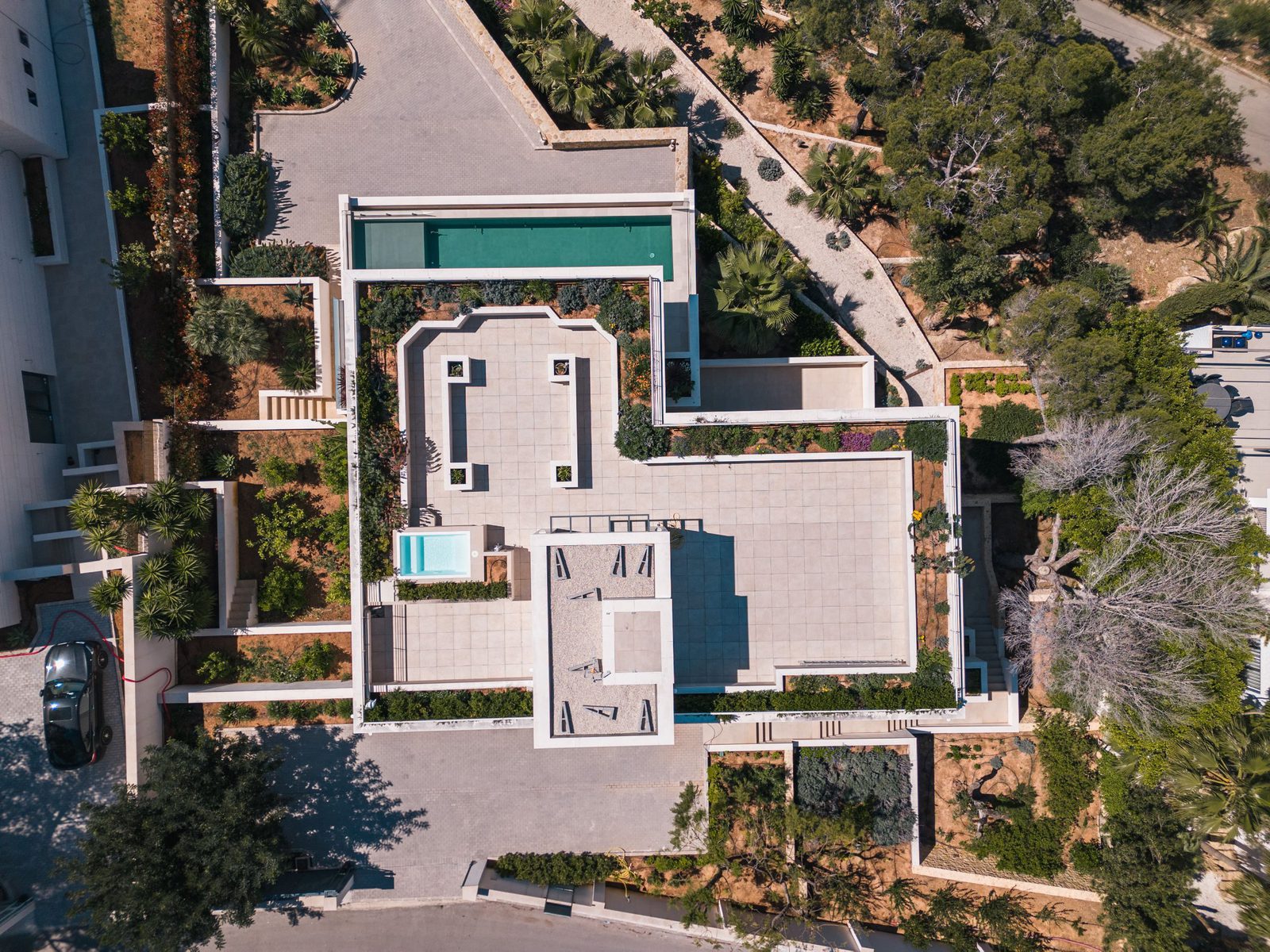 Aerial view of a modern 5-bedroom villa with pool and gardens in Altea - The Estates