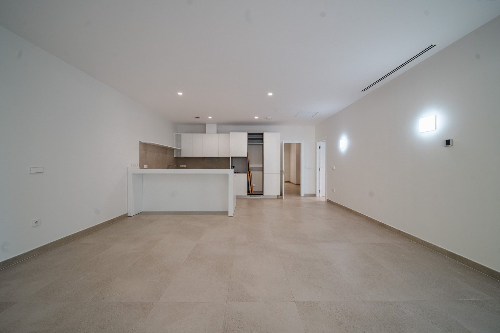 A bright, modern kitchen with island in a 5-bedroom villa in Altea - The Estates