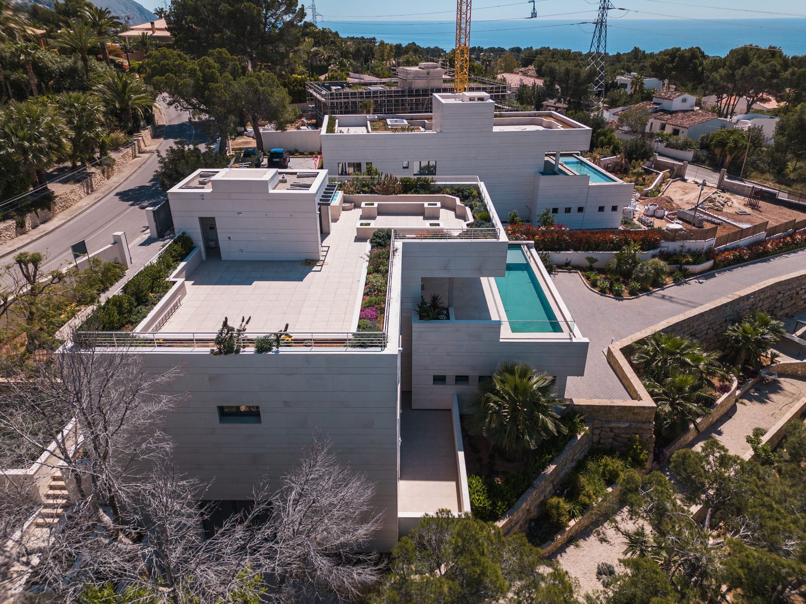Aerial view of a modern 5-bedroom villa with sea and golf views in Altea - The Estates