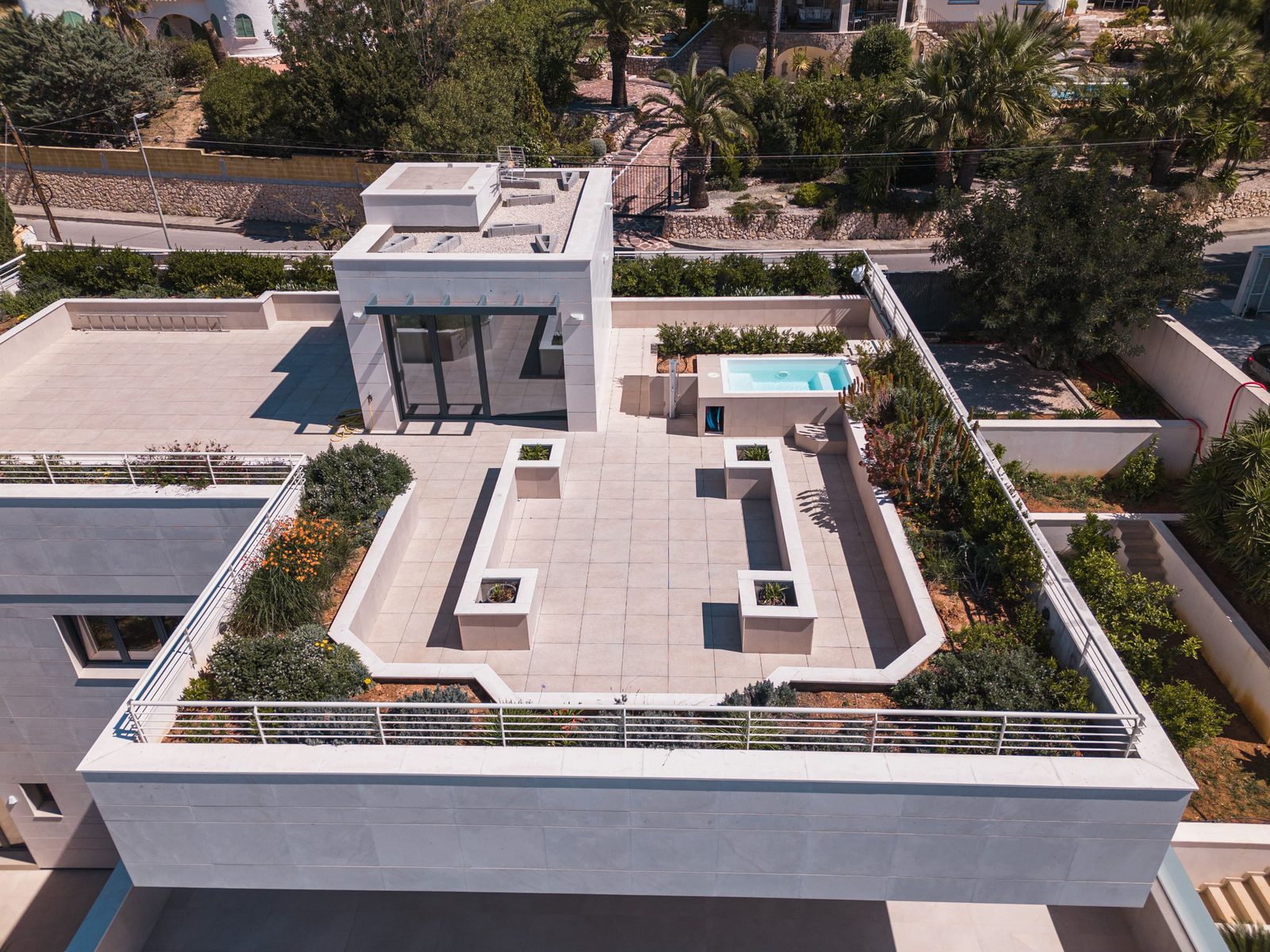 Aerial view of the rooftop terrace and pool of a 5-bedroom villa in Altea - The Estates