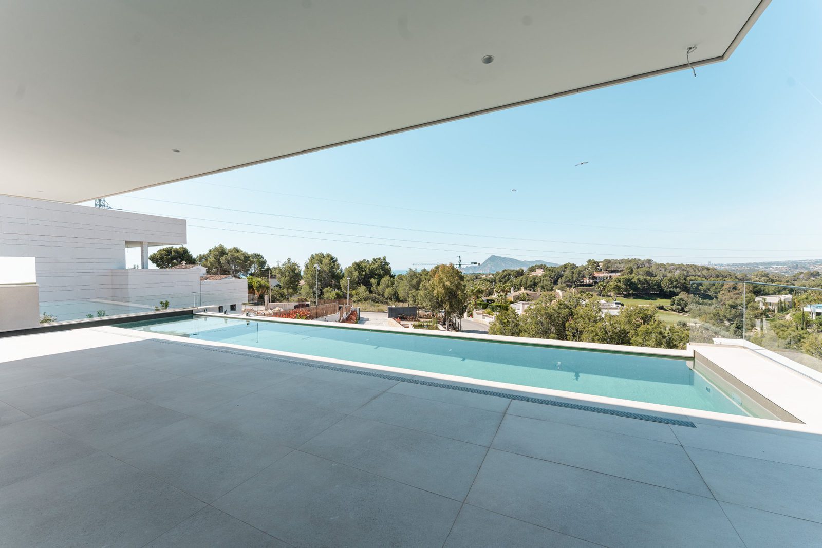 A stunning pool and terrace view of a 5-bedroom villa in Altea - The Estates