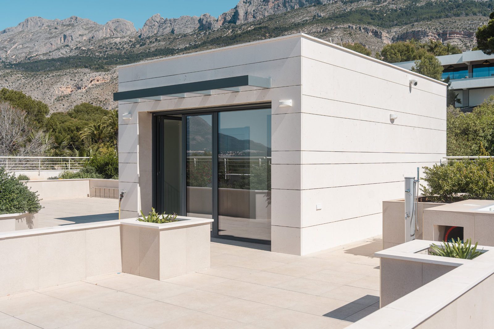 Modern exterior of a 5-bedroom villa in Altea with mountain views - The Estates