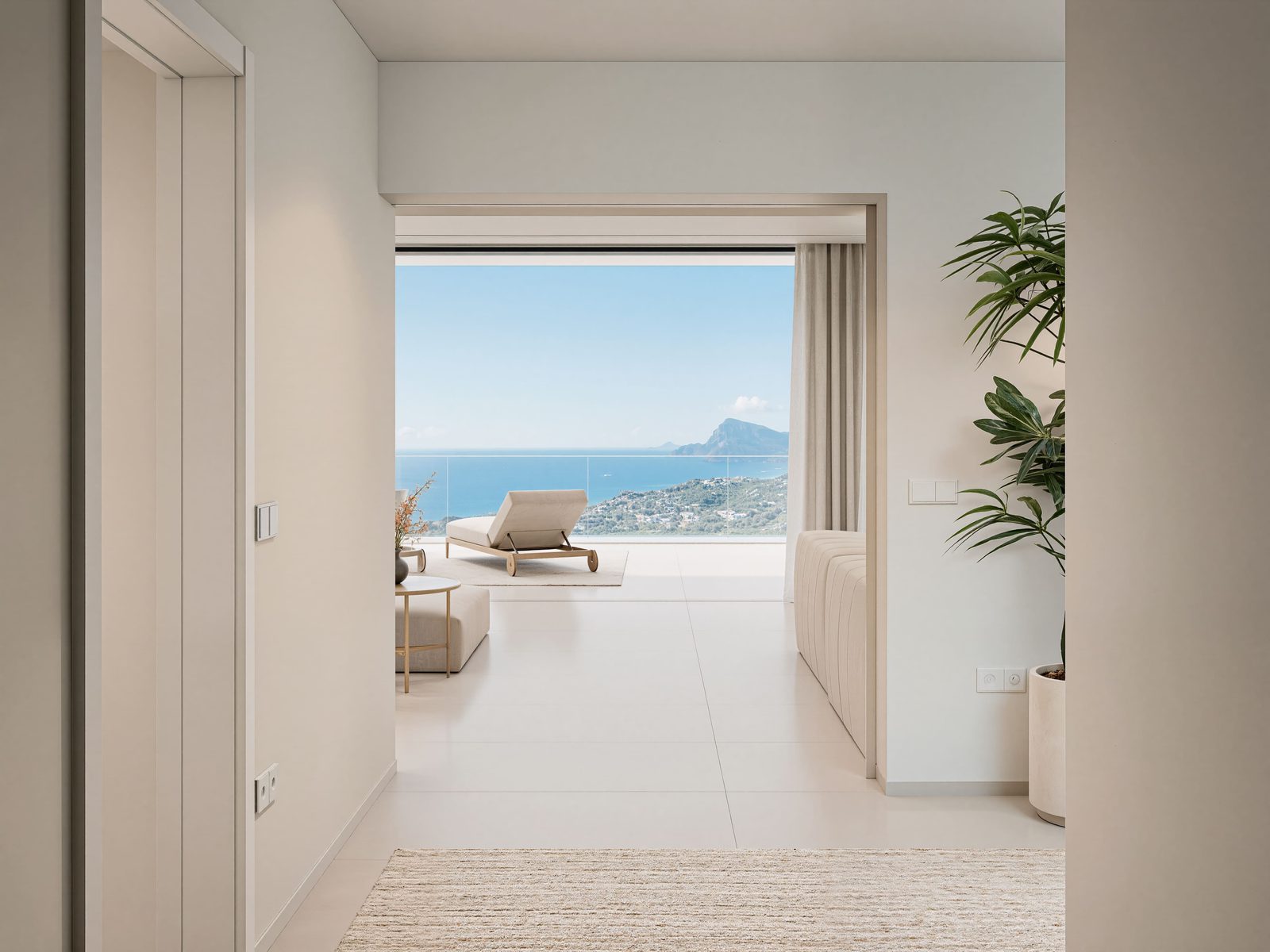 Bright interior hallway leading to a living area with stunning sea and golf views of a 5-bedroom villa in Altea - The Estates