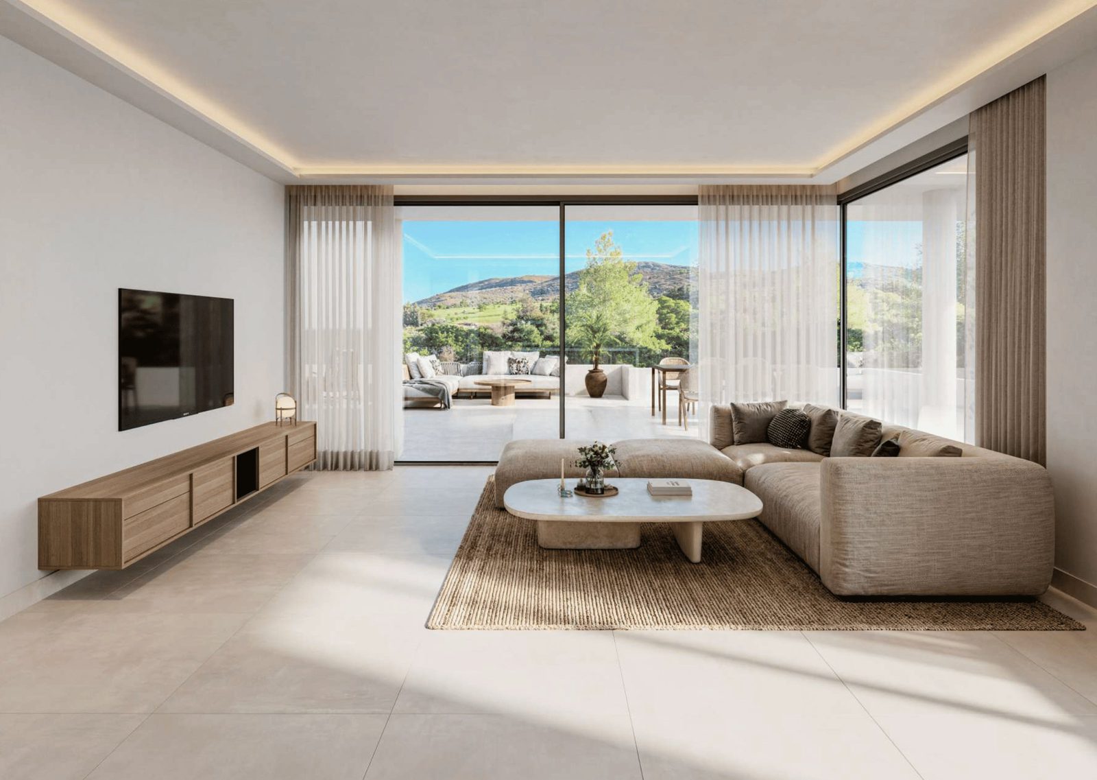 A bright living room with mountain views in a 3-bedroom apartment in Pedreguer - The Estates