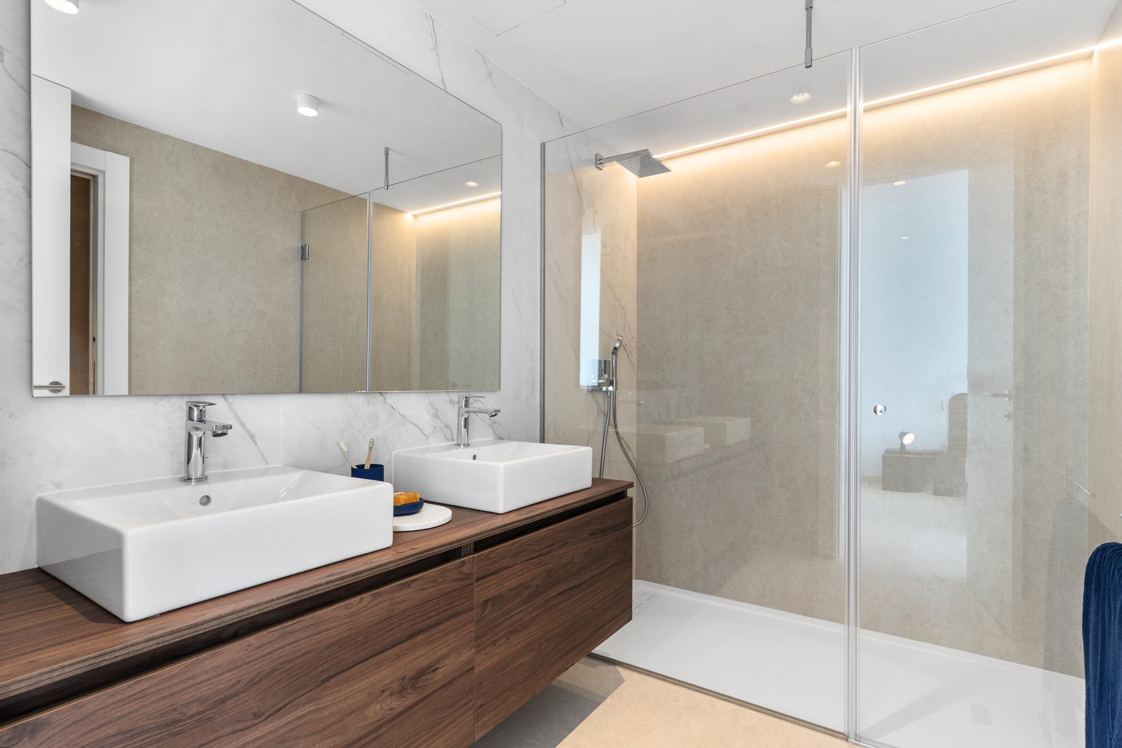 A modern bathroom with a walk-in shower in a 4-bedroom villa in Altea - The Estates