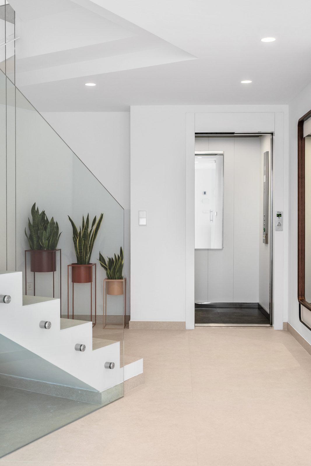Modern interior with staircase and elevator in a 4-bedroom villa in Altea - The Estates