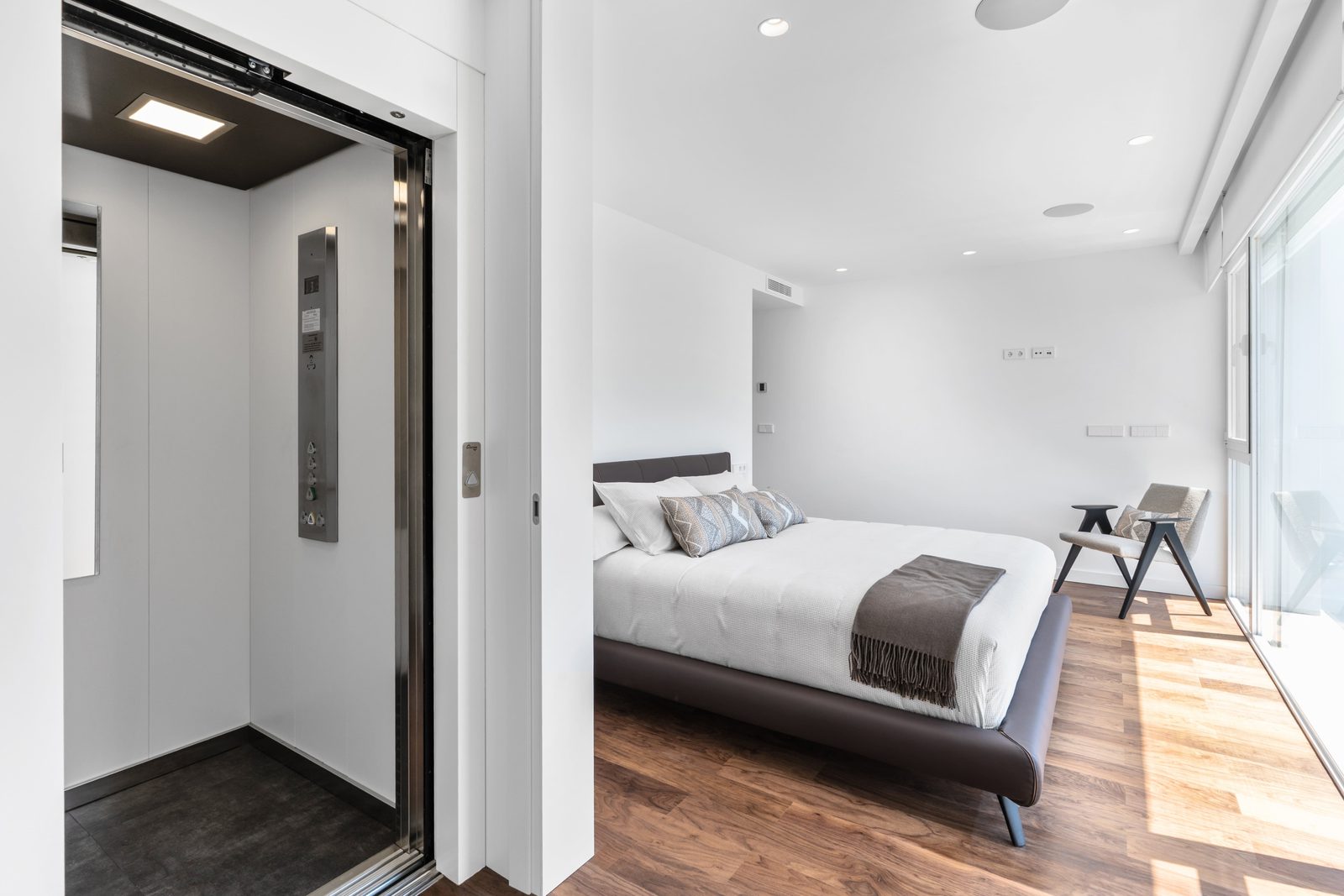 A modern bedroom with an elevator access in a 4-bedroom villa in Altea - The Estates