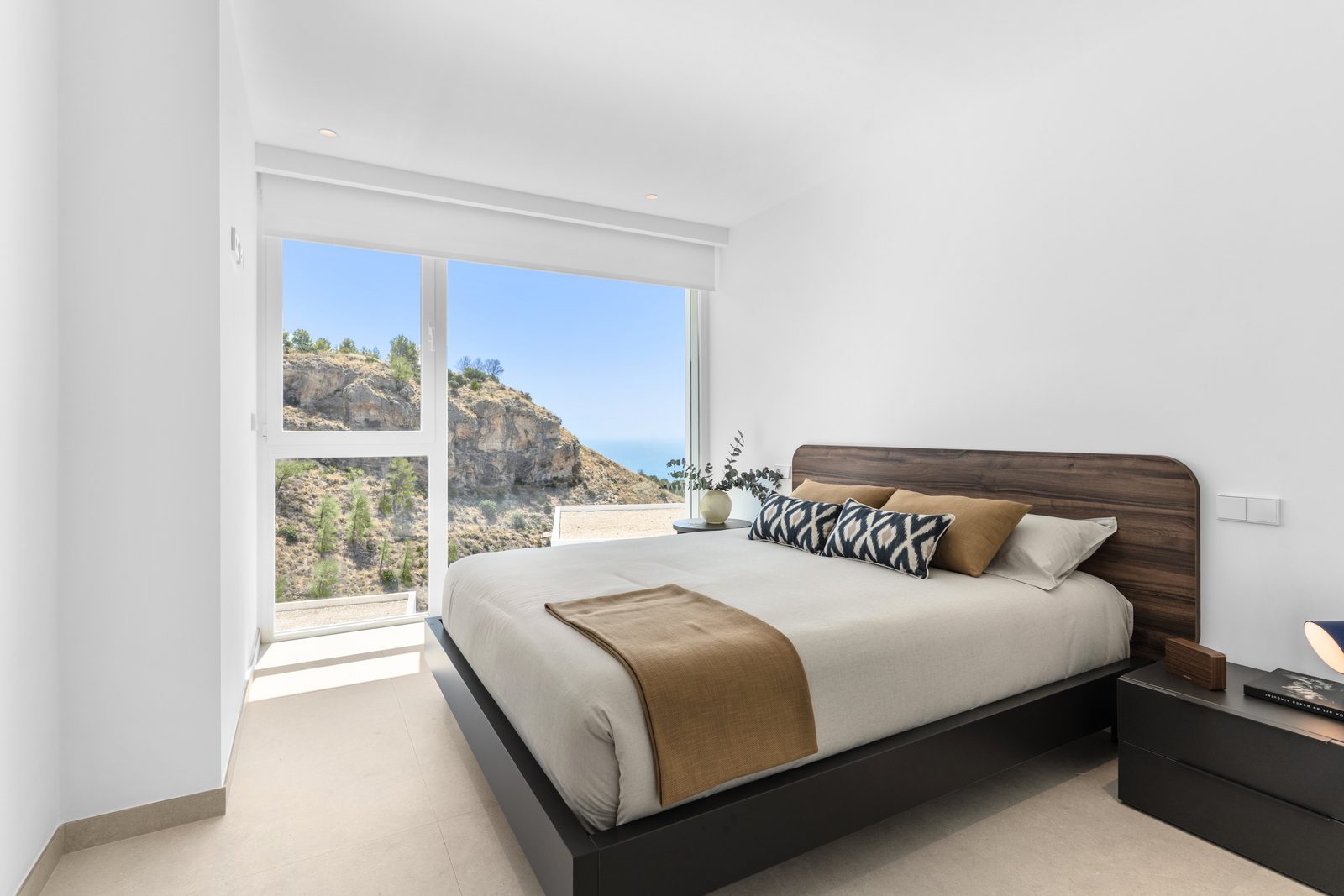 A bright bedroom with stunning sea and mountain views in a 4-bedroom villa in Altea - The Estates