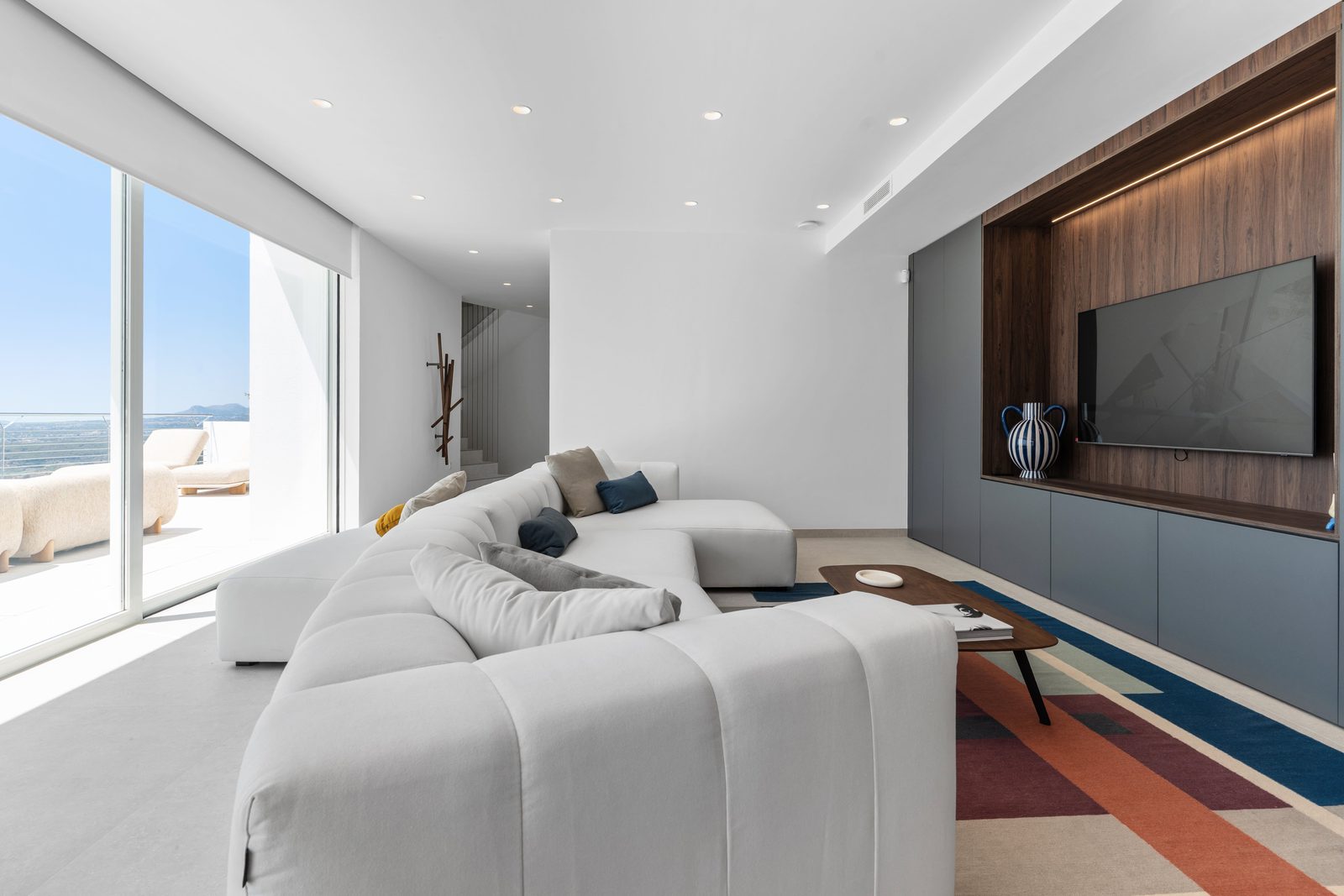 Stylish living room with sea views inside a 4-bedroom villa in Altea - The Estates