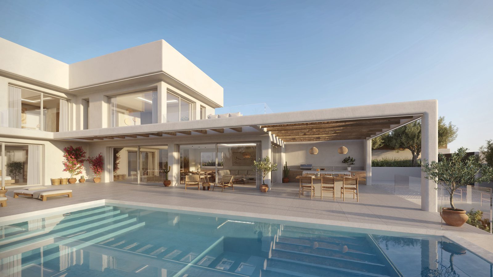 Modern pool terrace with outdoor kitchen at a 4-bedroom villa in Já