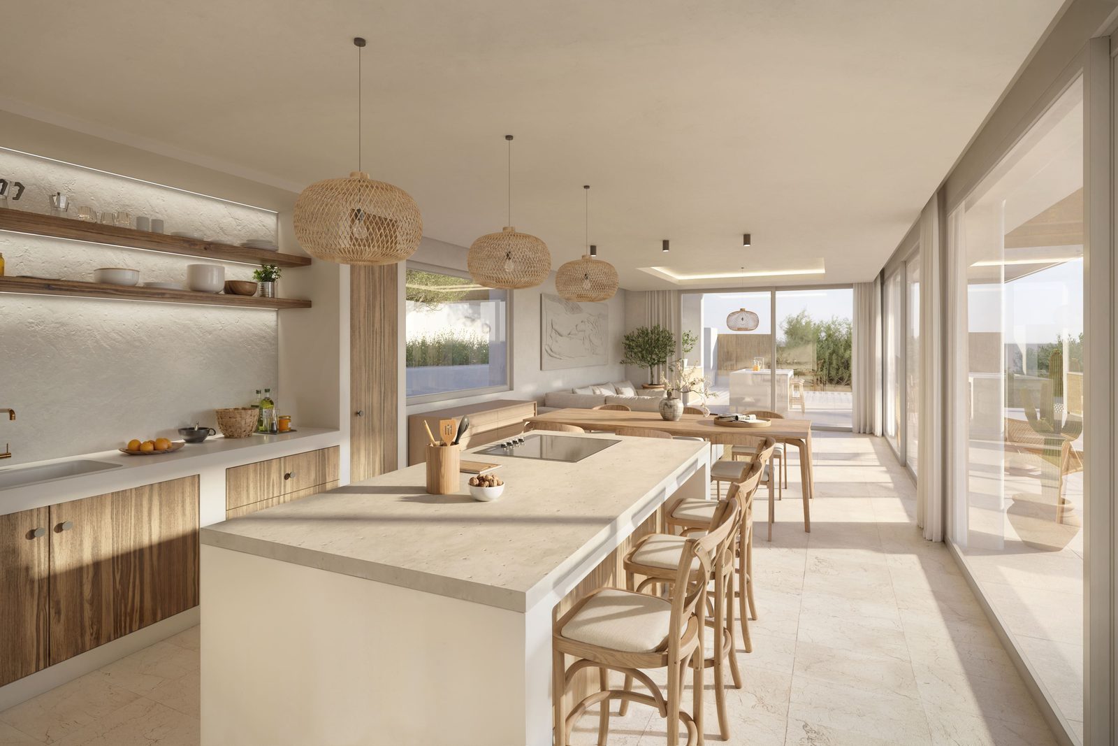 Open-plan kitchen, dining and living area with island and sea views in a 4-bedroom villa in Jávea - The Estates