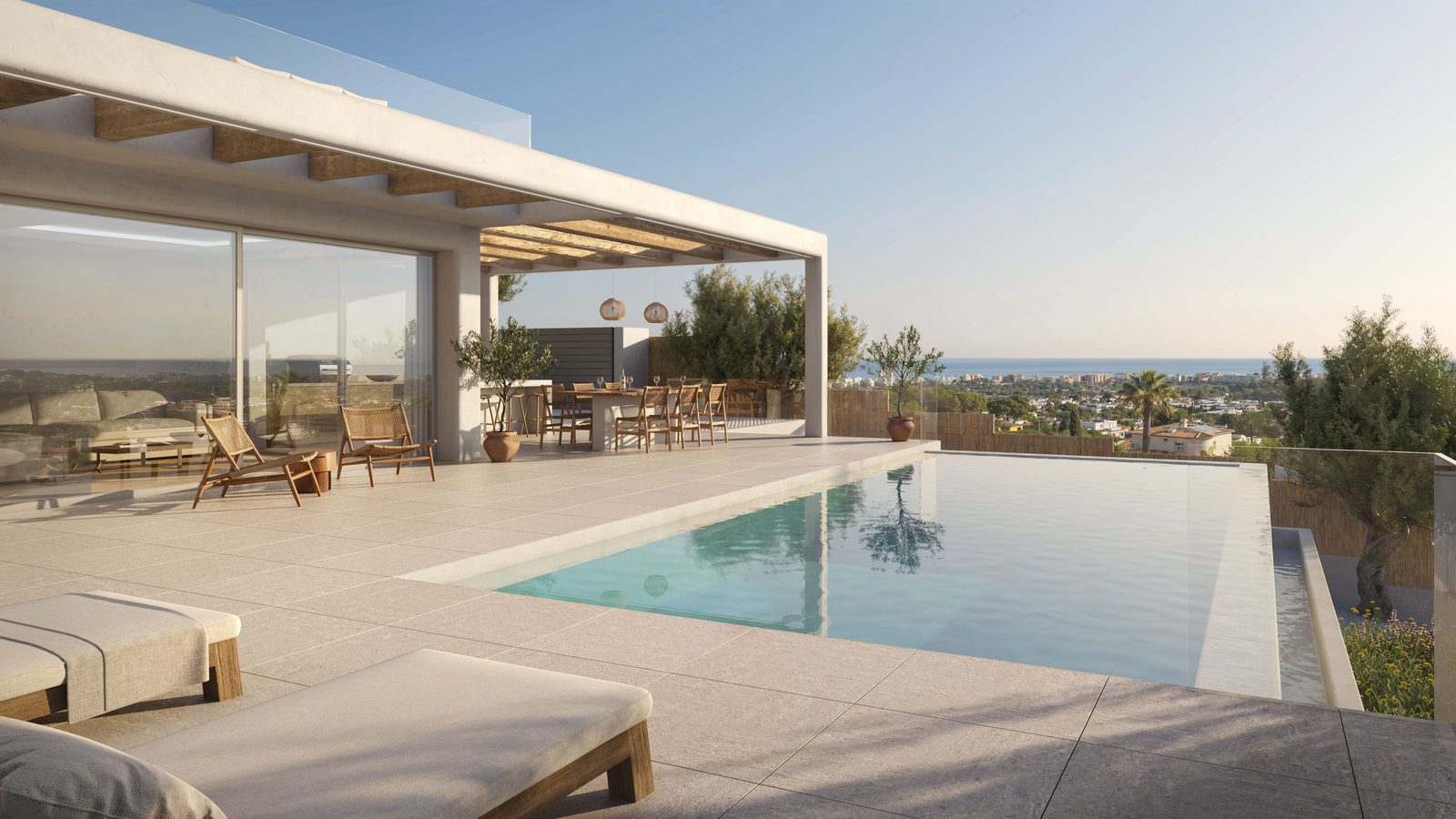 Pool terrace with outdoor dining and sea views of a 4