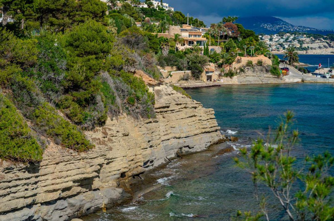 Coastal views and lush greenery surrounding a 6-bedroom villa in Calpe - The Estates