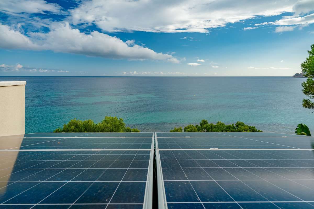 Panoramic sea views from a 6-bedroom villa in Calpe, featuring solar panels - The Estates