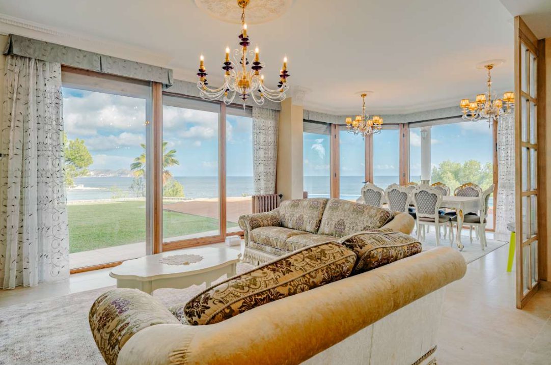 Elegant living room with panoramic sea views inside a 6-bedroom villa in Calpe - The Estates