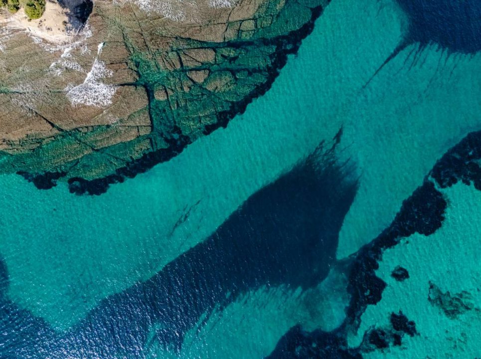 Stunning turquoise waters and rocky coastline near a 6-bedroom villa in Calpe - The Estates