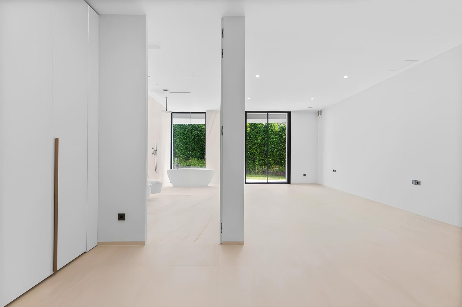 Modern bathroom interior with lush greenery views in a 7-bedroom villa in Altea - The Estates