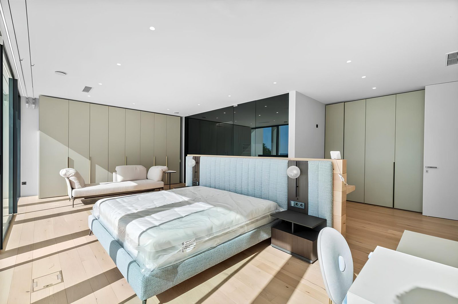 A luxurious bedroom with modern design and sea views in a 7-bedroom villa in Altea - The Estates