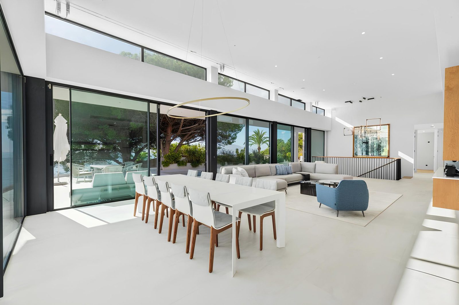 Bright living and dining area with sea views inside a 7-bedroom villa in Altea - The Estates