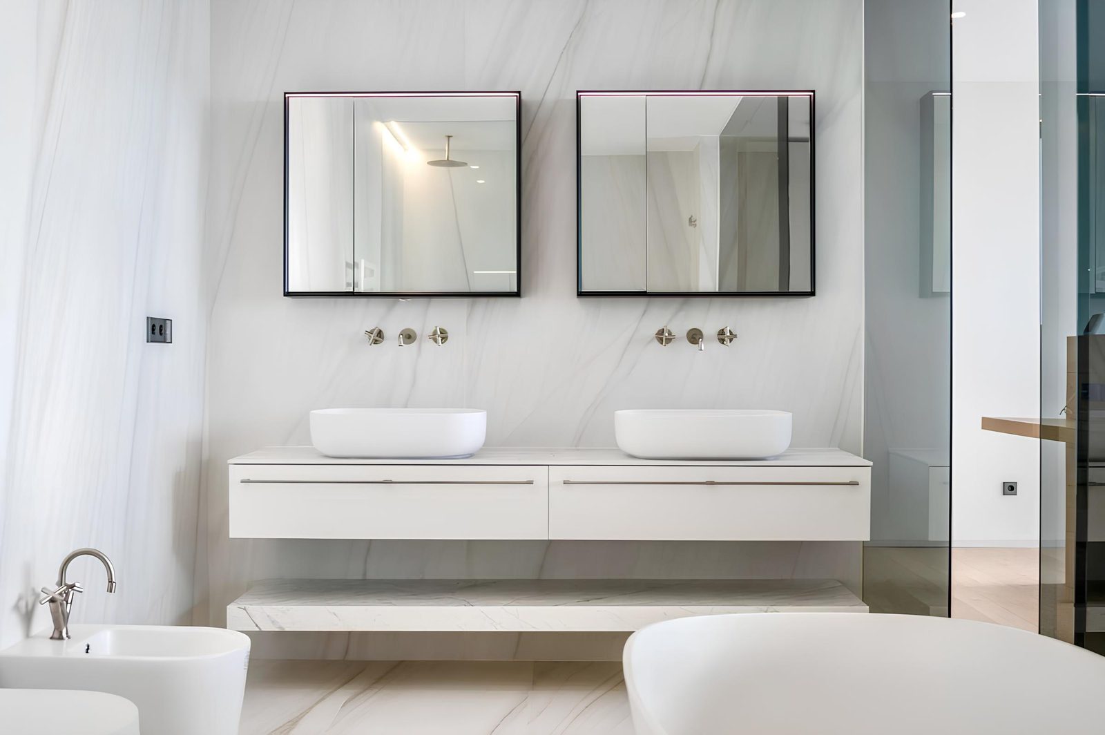 Stylish bathroom with double sinks and mirrors in a 7-bedroom villa in Altea - The Estates