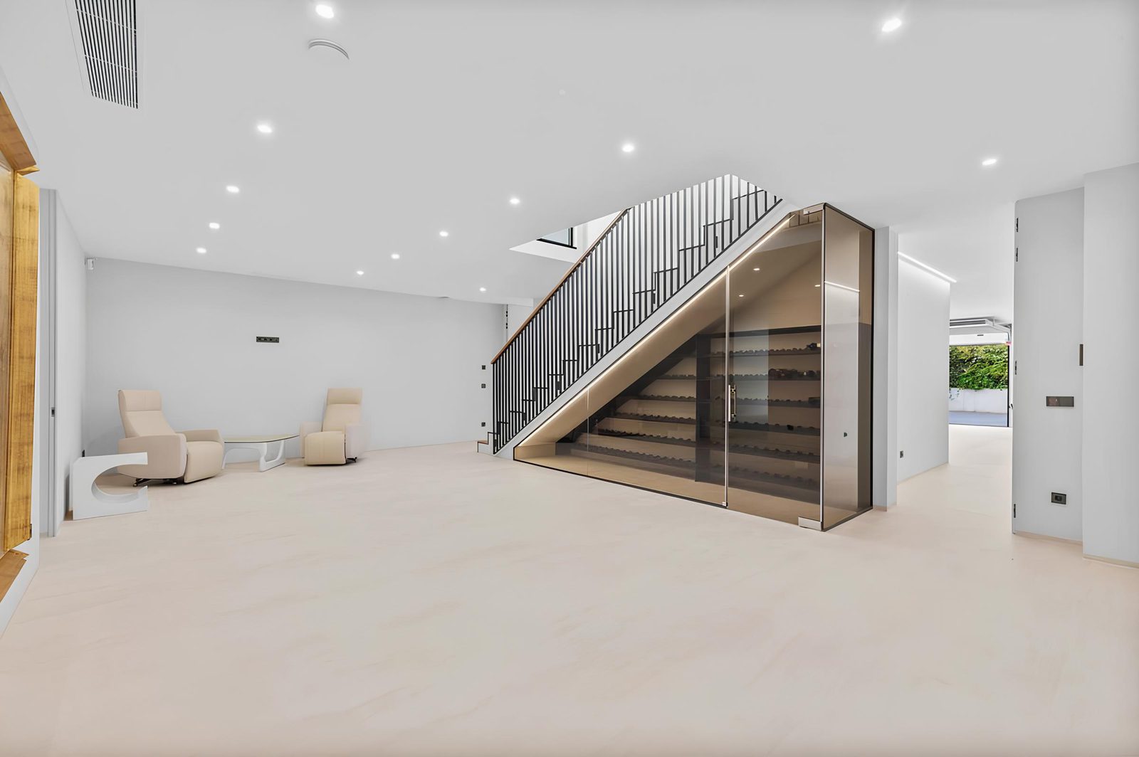 Stylish interior with a modern staircase and wine storage in a 7-bedroom villa in Altea - The Estates
