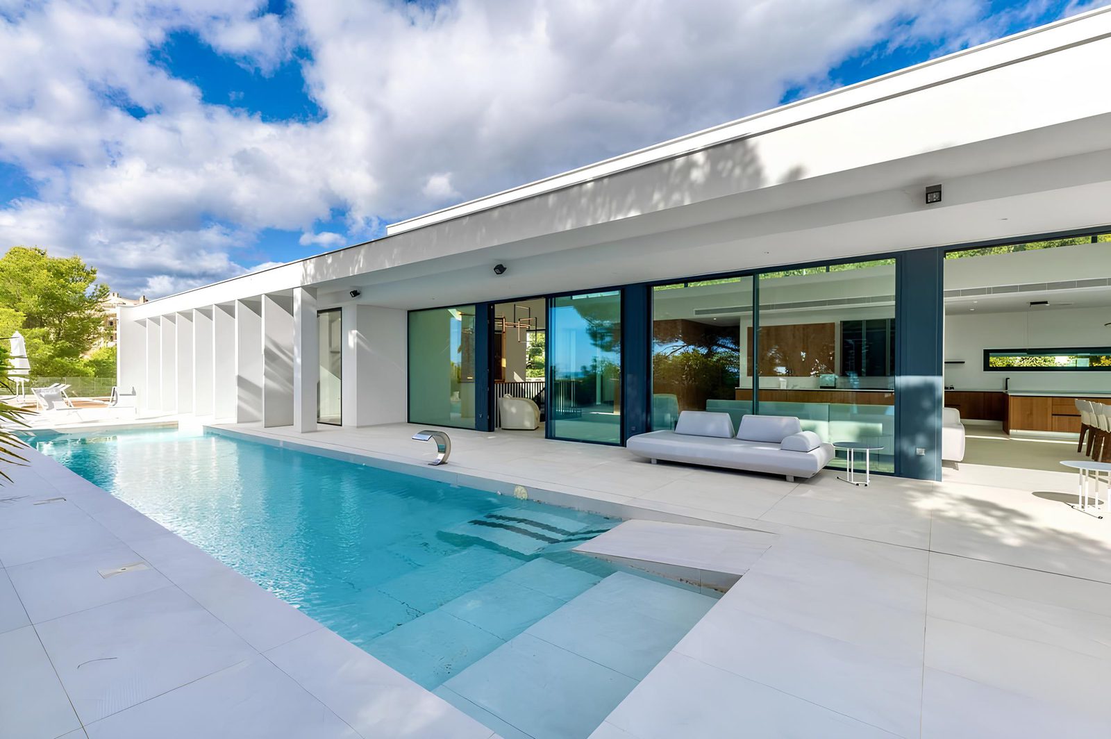 A luxurious pool and modern exterior of a 7-bedroom villa in Altea - The Estates