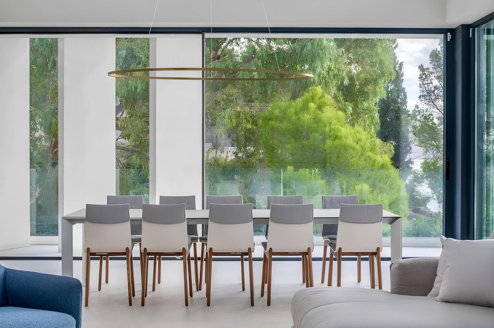 A modern dining area with sea views inside a 7-bedroom villa in Altea - The Estates