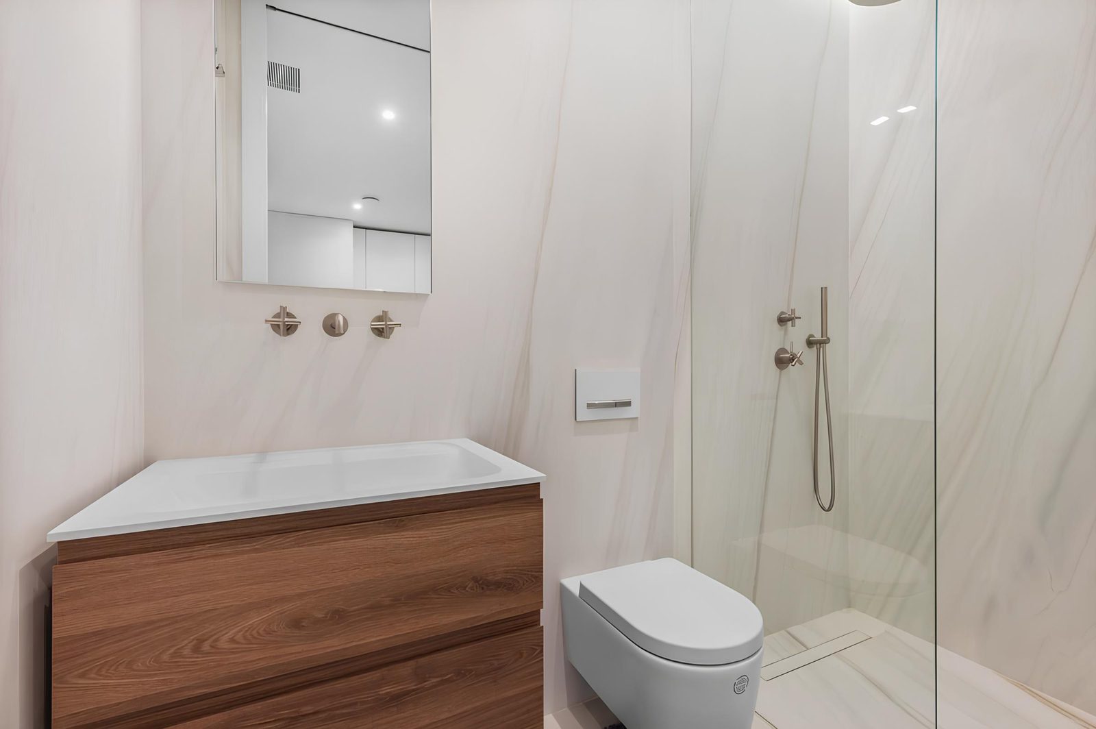 A modern bathroom with a walk-in shower in a 7-bedroom villa in Altea - The Estates
