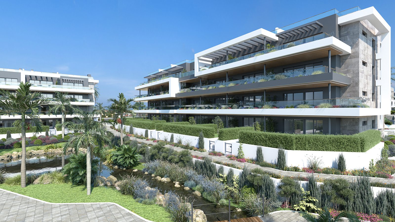Exterior view of a modern 2-bedroom bungalow in Torrevieja, surrounded by lush landscaping - The Estates