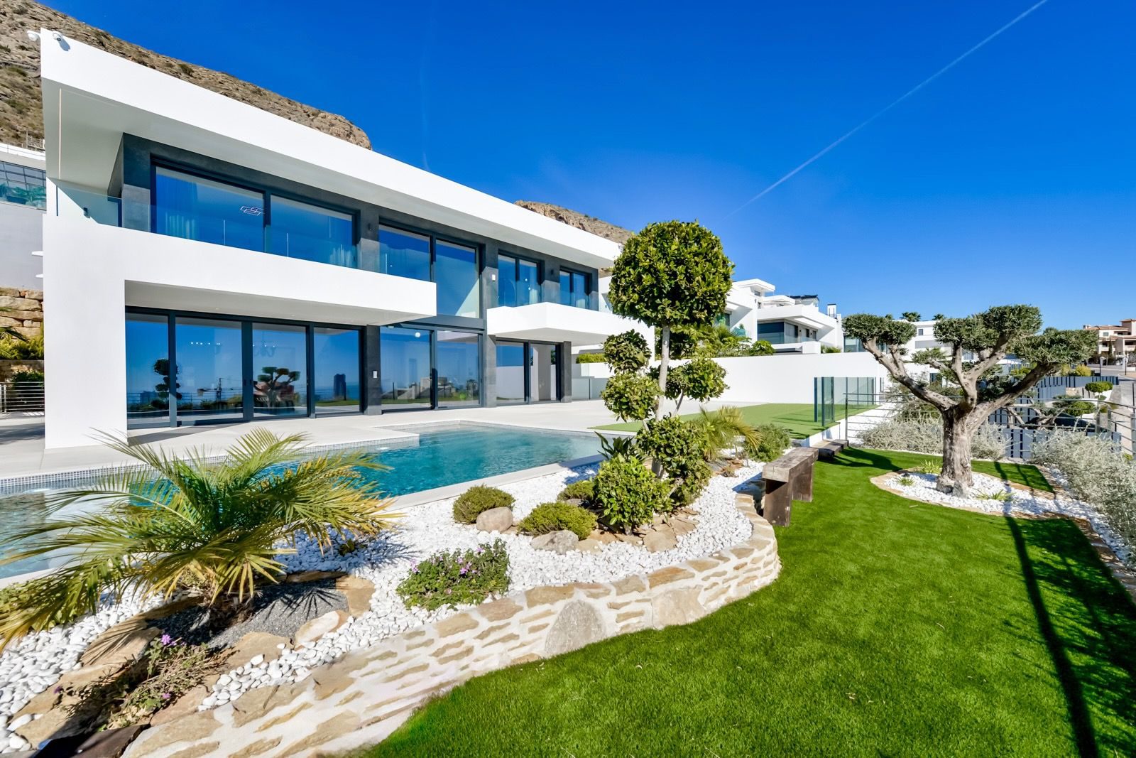 Modern exterior of a 7-bedroom villa with sea and city views in Finestrat - The Estates