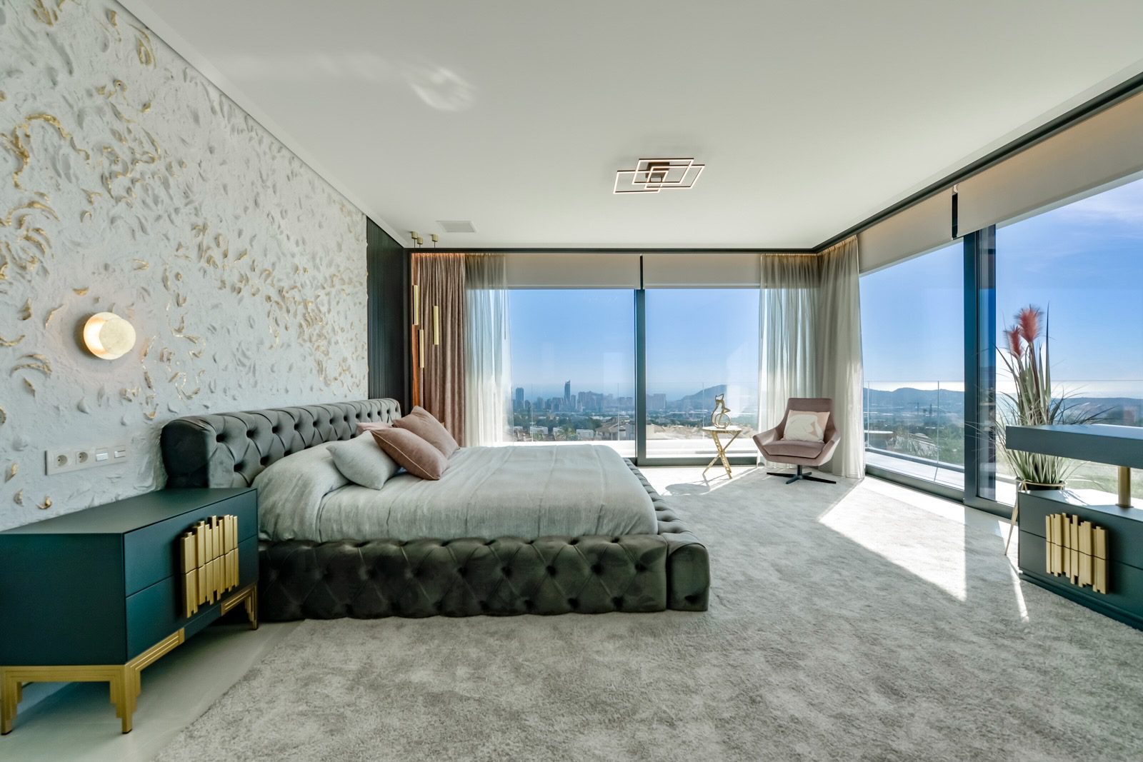 Luxurious bedroom with stunning sea and city views inside a 7-bedroom villa in Finestrat - The Estates