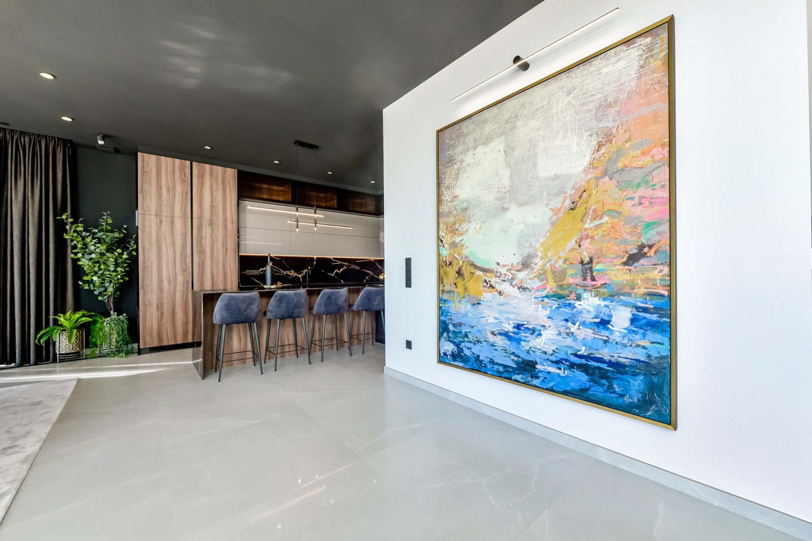Modern interior with artwork and bar area in a 7-bedroom villa in Finestrat - The Estates