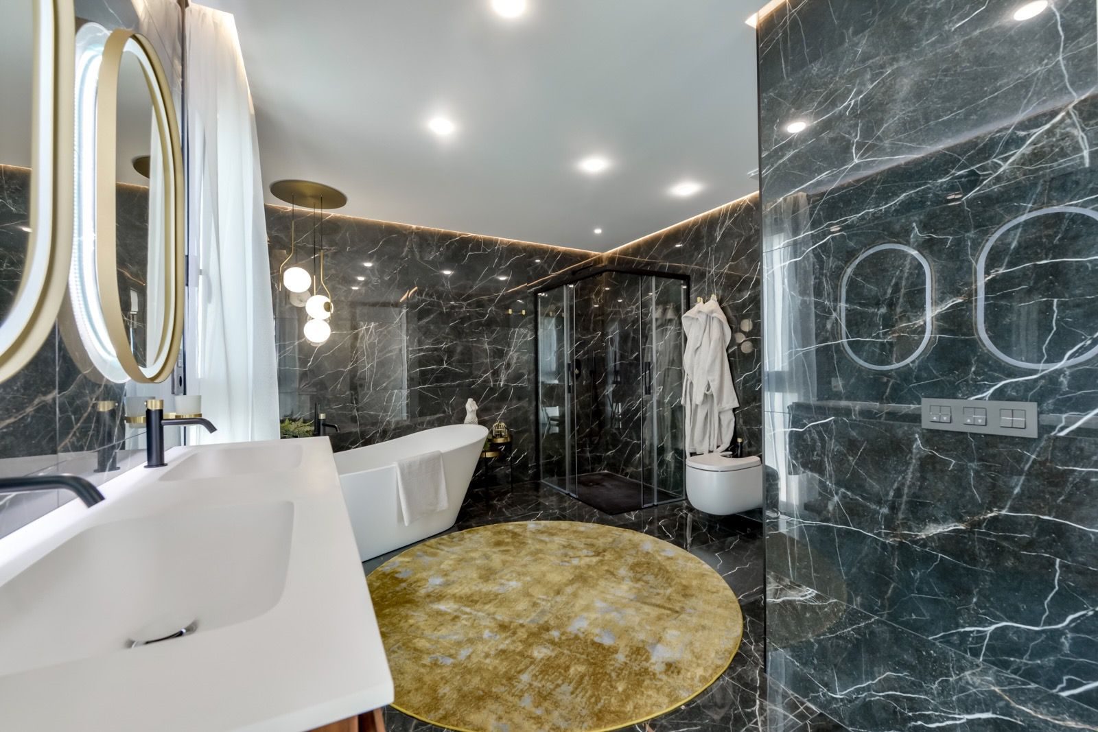 Luxurious bathroom with a walk-in shower and modern fixtures in a 7-bedroom villa in Finestrat - The Estates