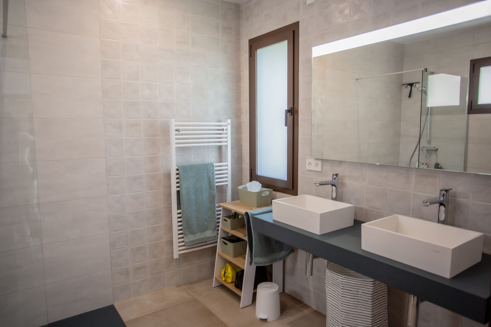 Modern bathroom with a window and stylish fixtures in a 3-bedroom villa in Javea - The Estates