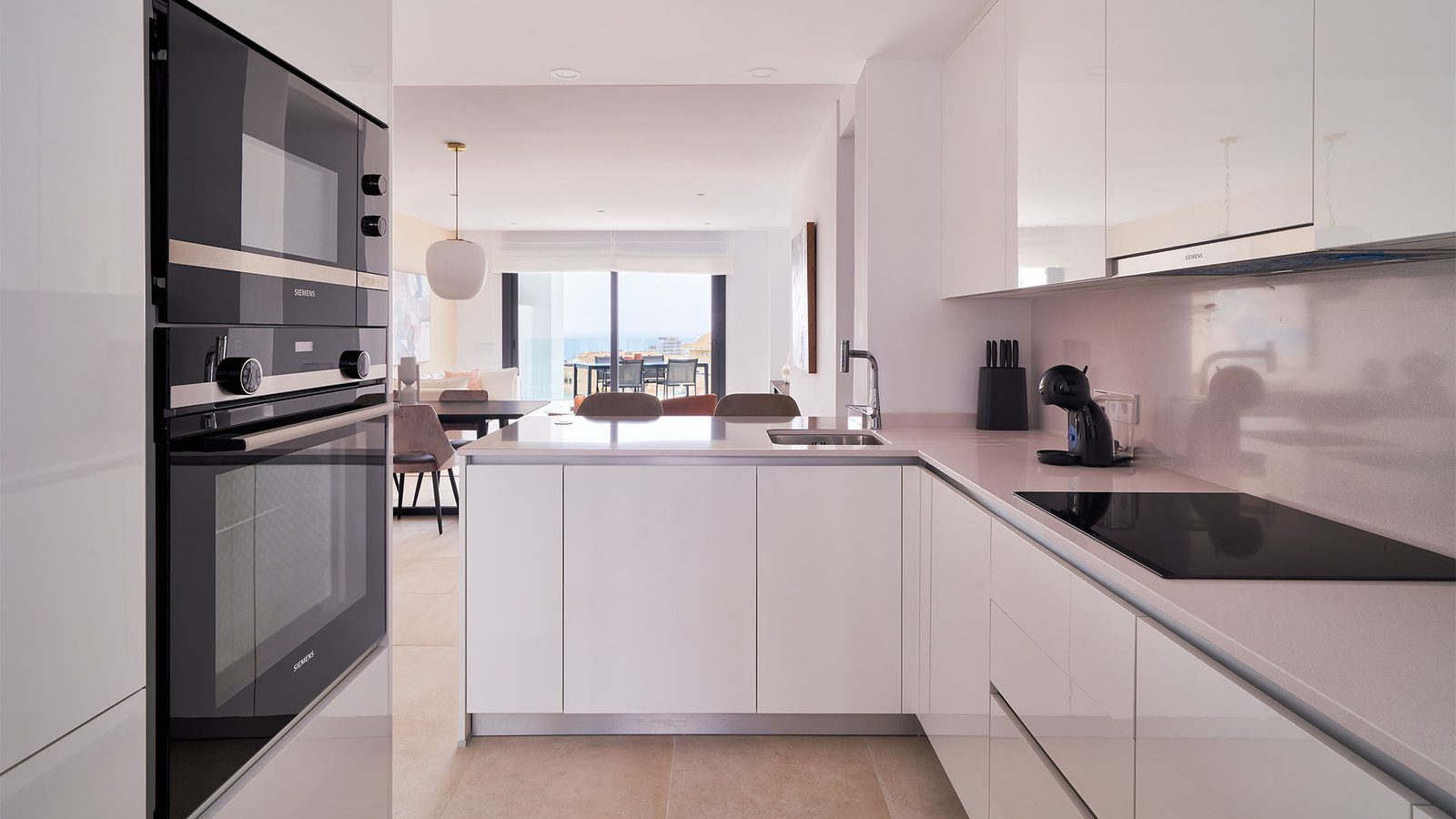 Modern kitchen with sea views in a 2-bedroom apartment in Fuengirola - The Estates