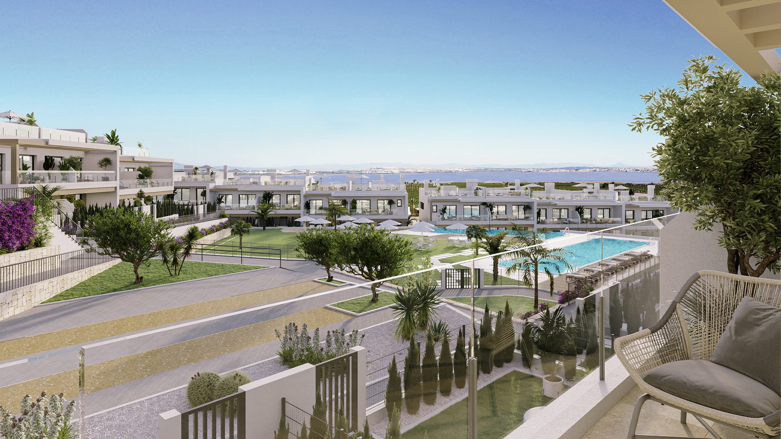 A view of the pool and surrounding gardens of a 2-bedroom bungalow in Torrevieja - The Estates