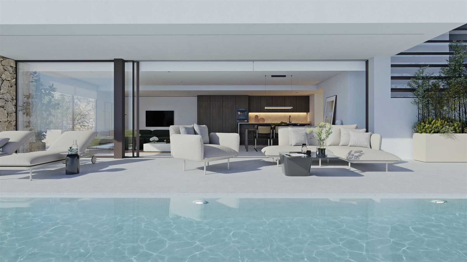 Pool terrace with outdoor seating and open-plan kitchen of a 4-bedroom villa in Altea - The Estates