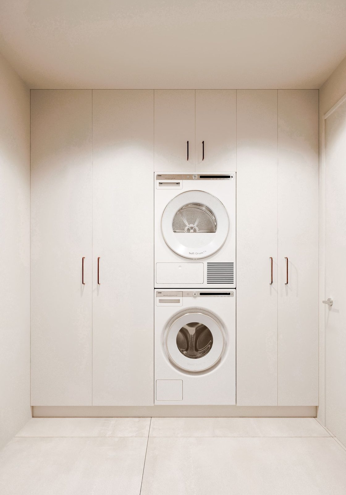 Utility room with built-in washer and dryer of a 3-bedroom villa in Algorfa - The Estates