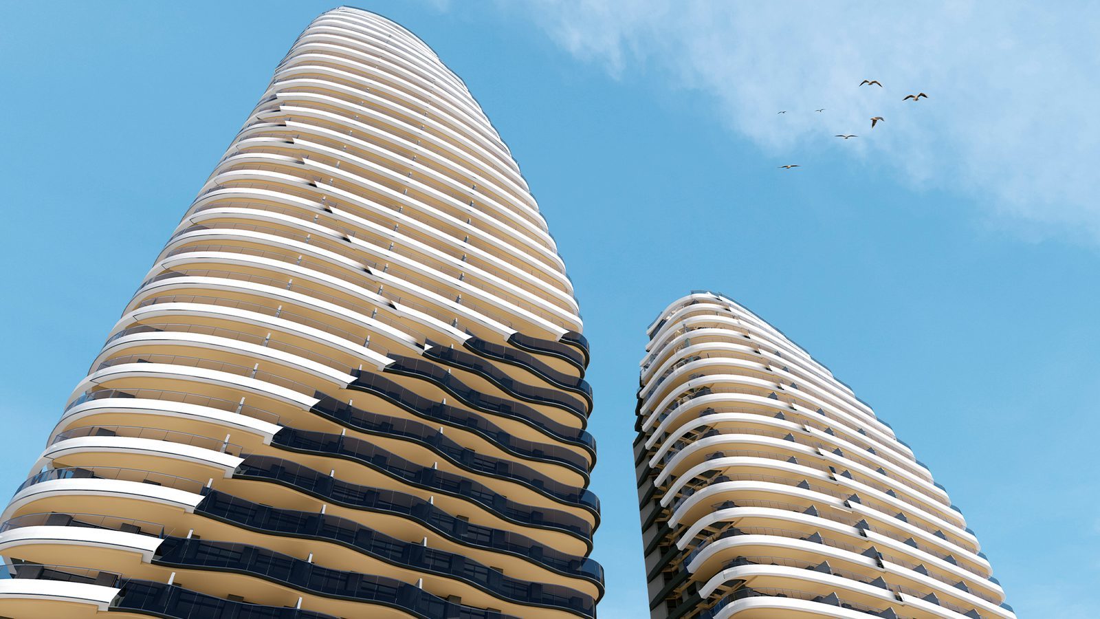 Modern apartment towers with curved balconies against a blue sky in Benidorm - The Estates