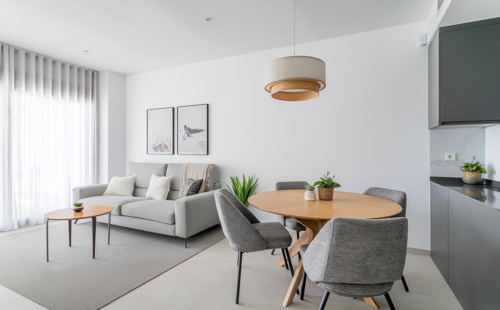 Stylish living room and dining area of a 2-bedroom apartment in Torrevieja - The Estates